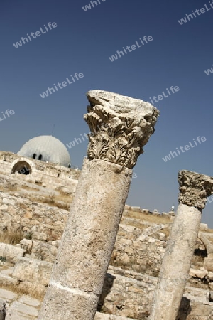 The Ruins of the citadel Jabel al Qalah in the City Amman in Jordan in the middle east.