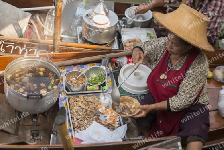 the floating market in the Town of Tha Kha in the Province Samut Songkhram west of the city of Bangkok in Thailand in Southeastasia.