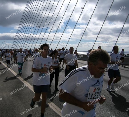 Running the Marathon - Vasco da Gama Bridge Lisbon