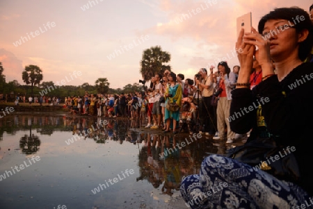 Tourists at the Angkor Wat in the Temple City of Angkor near the City of Siem Riep in the west of Cambodia.