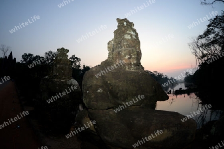 The Bridge at the Angkor Tom Gate in the Temple City of Angkor near the City of Siem Riep in the west of Cambodia.