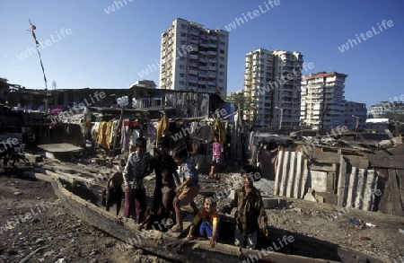 one of the slums in the city of Mumbai or Bombai in India.