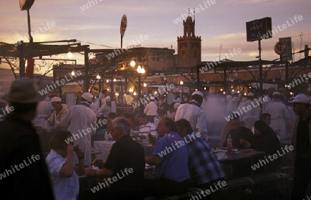 The Streetfood and Nightlife at the Djemma del Fna Square in the old town of Marrakesh in Morocco in North Africa.
