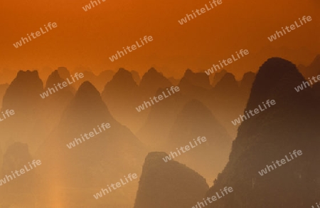 the landscape at the Li River near Yangshou near the city of  Guilin in the Province of Guangxi in china in east asia. 