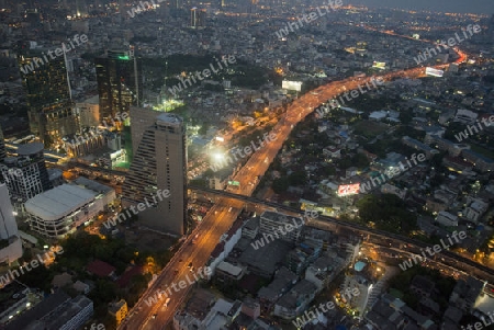 The Skyline view from the Sky Bar at the Riverside Aerea in the city of Bangkok in Thailand in Southeastasia.