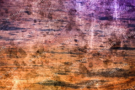 Old and weathered vintage wooden plank background with scratches 