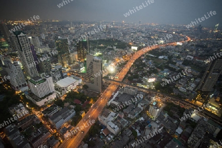 The Skyline view from the Sky Bar at the Riverside Aerea in the city of Bangkok in Thailand in Southeastasia.