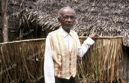 a men in the city of Moutsamudu on the Island of Anjouan on the Comoros Ilands in the Indian Ocean in Africa.   