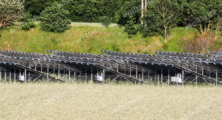 Generating clean energy with solar modules in a big park in northern Europe.