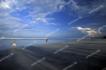 Die Kuta Beach in Kuta im sueden von Bali auf der Insel Bali in Indonesien.