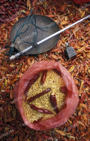 chili at a market street in the city of Chongqing in the province of Sichuan in china in east asia. 