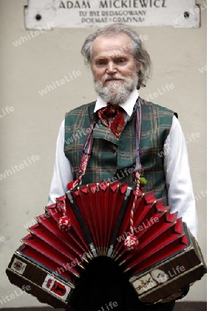 a men in traditional dress on a Summer Festival in a Parc in the old City of Vilnius in the Baltic State of Lithuania,  