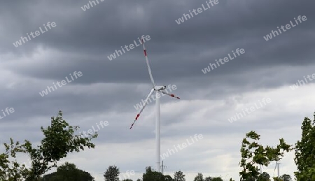 Panoramic view on alternative energy wind mills in a windpark