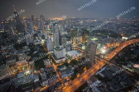 The Skyline view from the Sky Bar at the Riverside Aerea in the city of Bangkok in Thailand in Southeastasia.