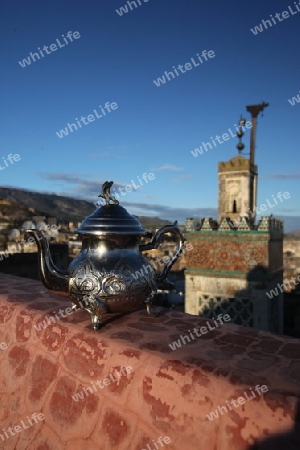 A Minttea in a teahouse in the old City in the historical Town of Fes in Morocco in north Africa.