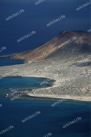 The  Isla Graciosa from the Mirador del Rio viewpoint on the Island of Lanzarote on the Canary Islands of Spain in the Atlantic Ocean. on the Island of Lanzarote on the Canary Islands of Spain in the Atlantic Ocean.
