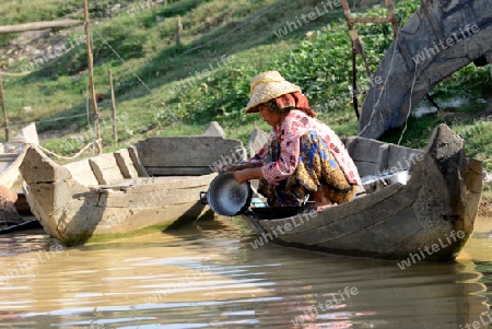 The People at wort in the Lake Village Kompong Pluk at the Lake Tonle Sap near the City of Siem Riep in the west of Cambodia.