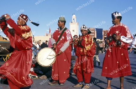 Traditional Music player at the Djemma del Fna Square in the old town of Marrakesh in Morocco in North Africa.
