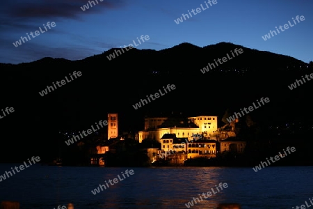 The Isla San Giulio in the Ortasee outside of the Fishingvillage of Orta on the Lake Orta in the Lombardia  in north Italy. 