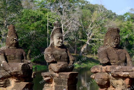 The Angkor Tom Gate in the Temple City of Angkor near the City of Siem Riep in the west of Cambodia.