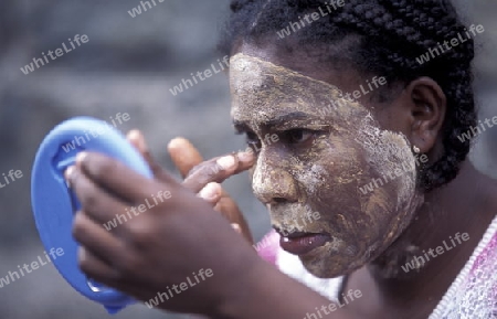 a women in the city of Moutsamudu on the Island of Anjouan on the Comoros Ilands in the Indian Ocean in Africa.   