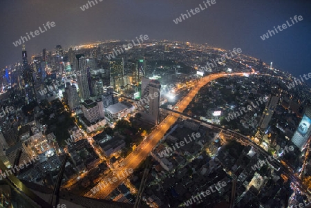 The Skyline view from the Sky Bar at the Riverside Aerea in the city of Bangkok in Thailand in Southeastasia.