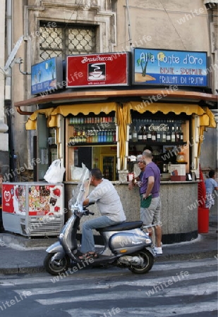 shops in the streets in the old Town of Catania in Sicily in south Italy in Europe.