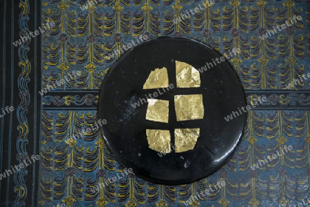 sheets of Gold leaf at a Gold pounder Factory the City of Mandalay in Myanmar in Southeastasia.