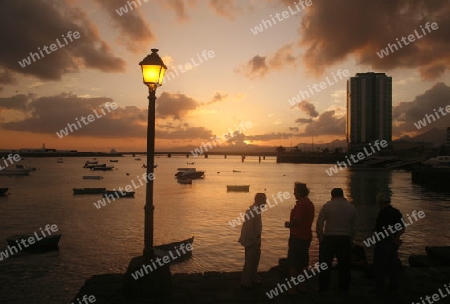 The promenade of the old town of the City of Arrecife on the Island of Lanzarote on the Canary Islands of Spain in the Atlantic Ocean. on the Island of Lanzarote on the Canary Islands of Spain in the Atlantic Ocean.
