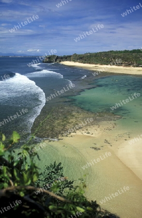 Ein Strand bei Padang im sueden von Bali auf der Insel Bali in Indonesien.