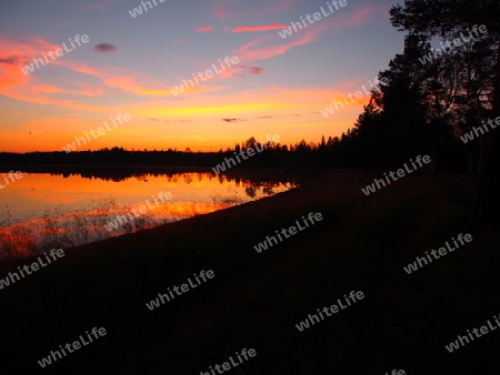 Badestrand bei Sonnenuntergang in Schweden