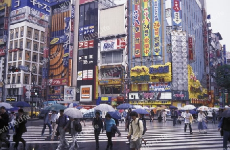 A Road with Shopping and Trafic in the City centre of Tokyo in Japan in Asia,



