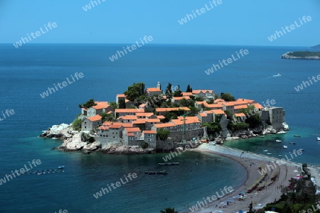 Die Altstadtinsel von Sveti Stefan in der Adria an der Kueste in Montenegro im Balkan am Mittelmeer in Europa.