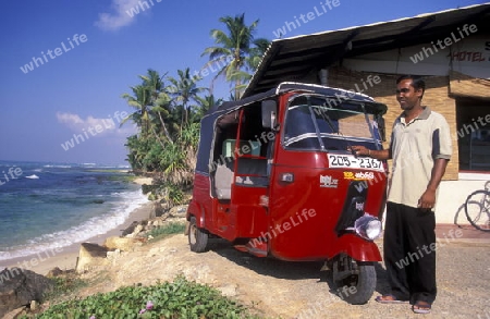 Ein Strand bei Hikkaduwa im sueden von Sri Lanka in Asien.