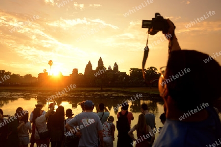 Tourists at the Angkor Wat in the Temple City of Angkor near the City of Siem Riep in the west of Cambodia.