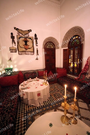 A Restaurant in the old City in the historical Town of Fes in Morocco in north Africa.