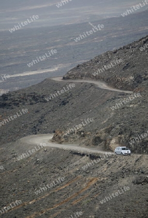 The Road in the Jandia Natural Parc on the south of the Island Fuerteventura on the Canary island of Spain in the Atlantic Ocean.