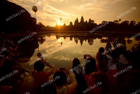 Tourists at the Angkor Wat in the Temple City of Angkor near the City of Siem Riep in the west of Cambodia.