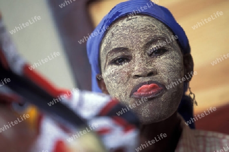 a women in the city of Moutsamudu on the Island of Anjouan on the Comoros Ilands in the Indian Ocean in Africa.   