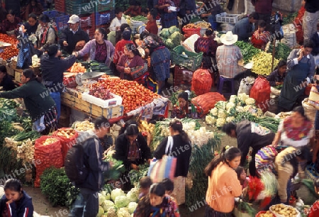 people in traditional clotes at the Market in the Village of  Chichi or Chichicastenango in Guatemala in central America.   