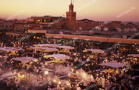 The Streetfood and Nightlife at the Djemma del Fna Square in the old town of Marrakesh in Morocco in North Africa.
