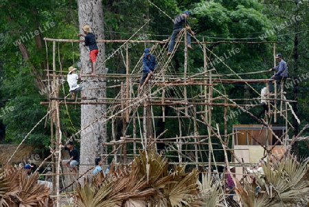 A construction for a traditional Woodhouse in the Angkor Thom  in the Temple City of Angkor near the City of Siem Riep in the west of Cambodia.