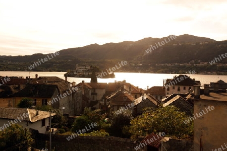 The Isla San Giulio in the Ortasee outside of the Fishingvillage of Orta on the Lake Orta in the Lombardia  in north Italy. 