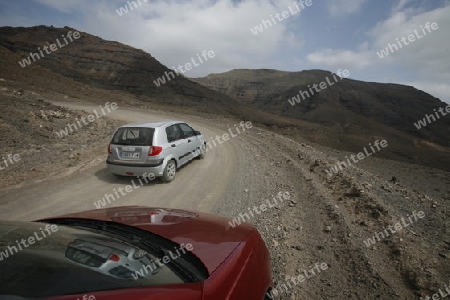 The Road in the Jandia Natural Parc on the south of the Island Fuerteventura on the Canary island of Spain in the Atlantic Ocean.