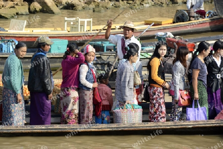 people at the Boat landing Pier at the Nan Chaung Main Canal in the city of Nyaungshwe at the Inle Lake in the Shan State in the east of Myanmar in Southeastasia.