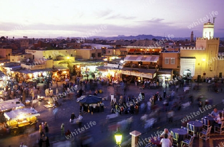 The Streetfood and Nightlife at the Djemma del Fna Square in the old town of Marrakesh in Morocco in North Africa.
