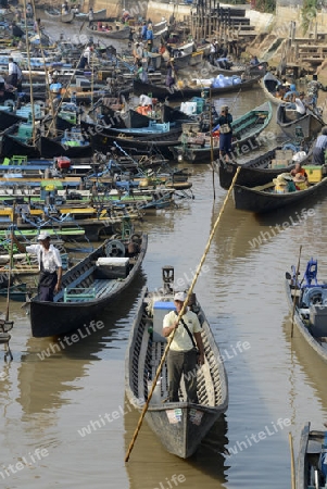 the Boat landing Pier at the Nan Chaung Main Canal in the city of Nyaungshwe at the Inle Lake in the Shan State in the east of Myanmar in Southeastasia.