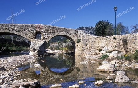 Eine alte Steinbruecke in Pollenca im osten  der Insel Mallorca im Mittelmeer in Spanien.