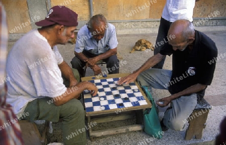 people play geams in the city of Santiago de Cuba on Cuba in the caribbean sea.