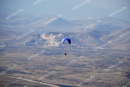 Man with a hang glider